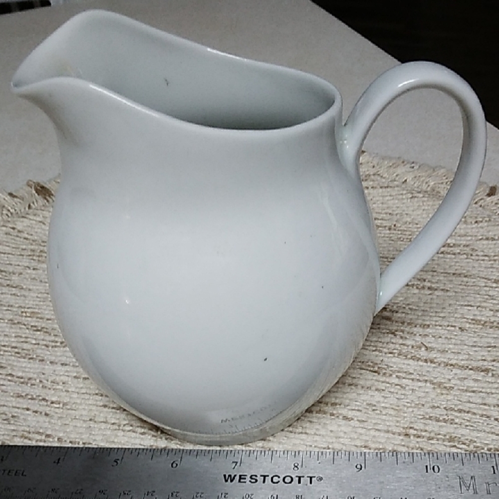 Elegant White Ceramic Pitcher